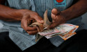  Rupee in narrow range ahead of US inflation, Fed minutes 