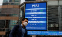 Stocks and gold cheer cooler U.S. inflation, dollar slides