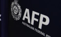 AFP bans use of controversial spit hoods after review