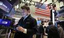 Wall St dips to lower close as rate hike bets firm, banks jump 