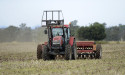 Tractor convoy rolls as farmers lash powerline plan