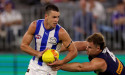Kangaroos lose star midfielder for Demons clash