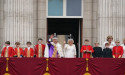  King and Queen watch scaled-down flypast from palace balcony 