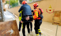  At least three dead as heavy rains in Italy burst riverbanks and flood towns 