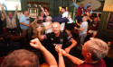  Celebrating West Ham fans dance on tables after European final win 