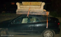  Man banned from driving after loading sofa and mattress on to soft-top car 