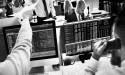 Rising yields put pressure on stocks, dollar stretches higher