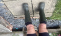  Runner sets blistering new record for running half marathon in wellies 