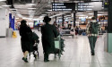 Emotional travellers arriving in UK describe Hamas rocket attacks