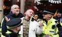  Tommy Robinson sprayed by police during arrest at march against antisemitism 