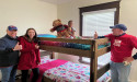 SLEEP IN HEAVENLY PEACE VOLUNTEERS DELIVER 200,000TH BED TO FAMILY IN NEED