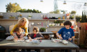 Enhancing Outdoor Living: The Benefits of Pool Houses and Outdoor Kitchens