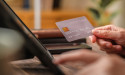 American Express surpasses EPS forecasts and raises guidance, yet shares fall