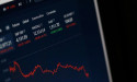 Asian shares display mixed performance amidst trade tensions and rate uncertainty