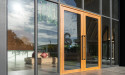Interior Glass Doors Improve Light Flow and Enhance Open Space Design