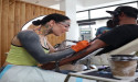 Olive & Co. Studios Artist Champions Transformative Power of Tattoo Cover-Ups, Offering Second Chances Through Ink