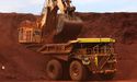 BHP’s chief Andrew Mackenzie gets a sheer slice of $8.9 billion profit