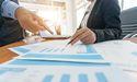 How Noah Holdings Aligns with Trends in NASDAQ Companies by Market Cap
